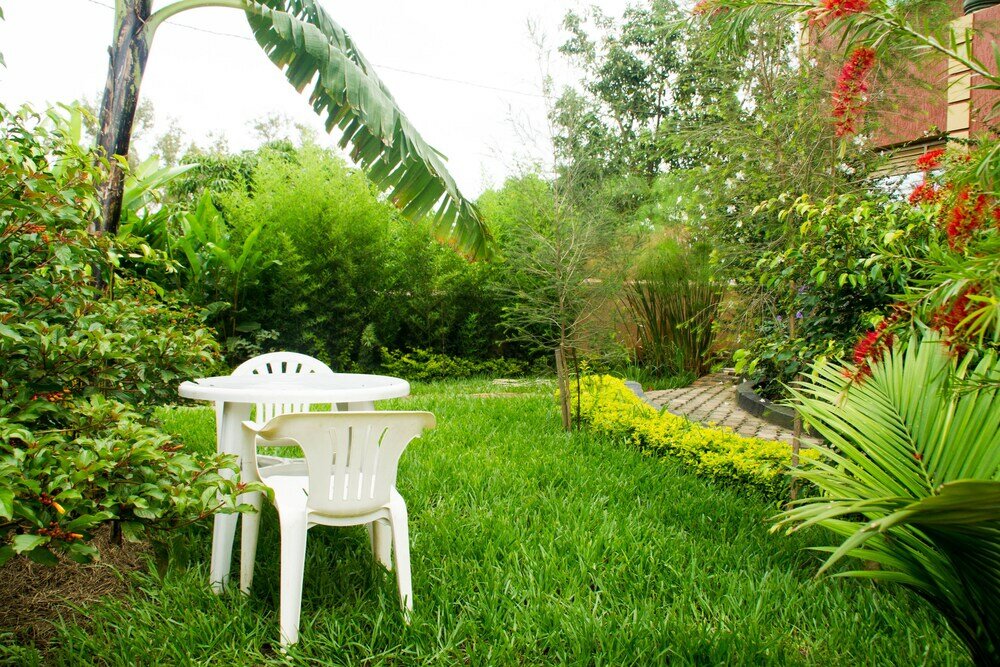 Фото Homely Nest Hotel