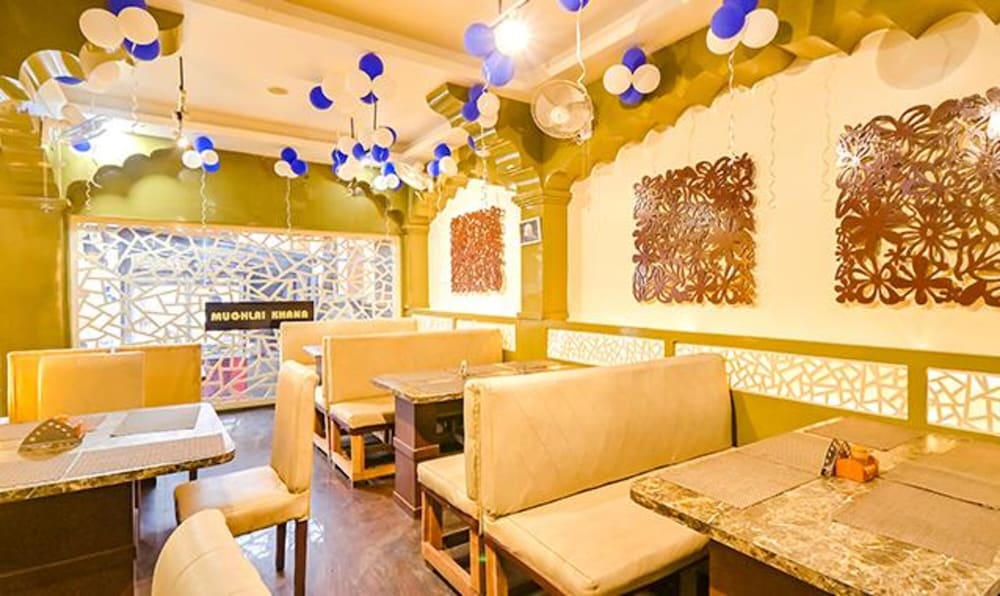 Фото Fabhotel Gns Suites