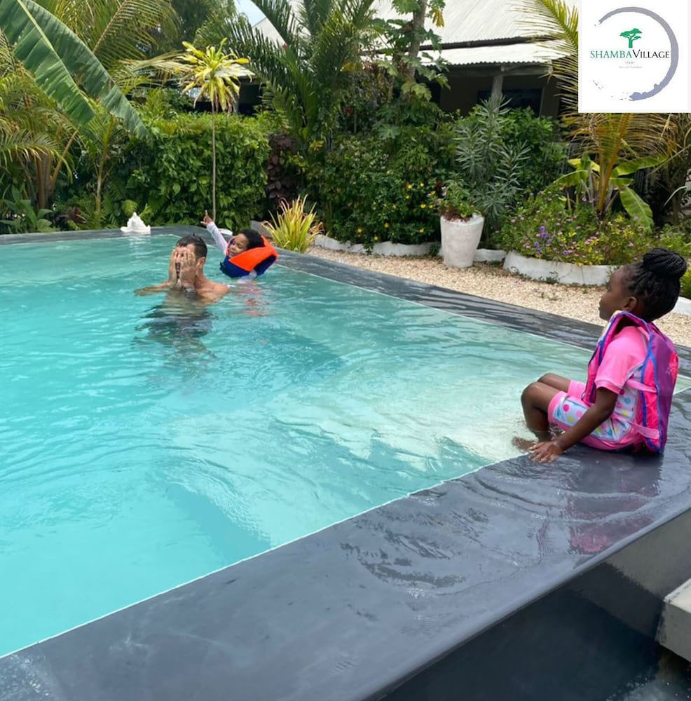 Фото Shamba Village Hotel