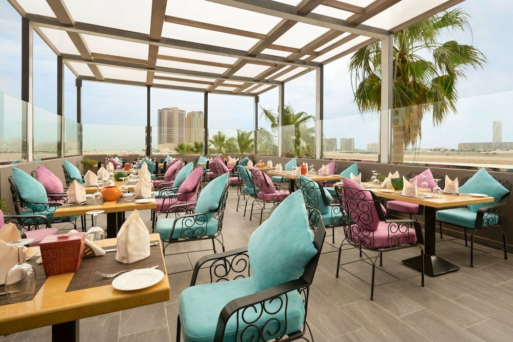 Фото Ramada by Wyndham Manama City Centre