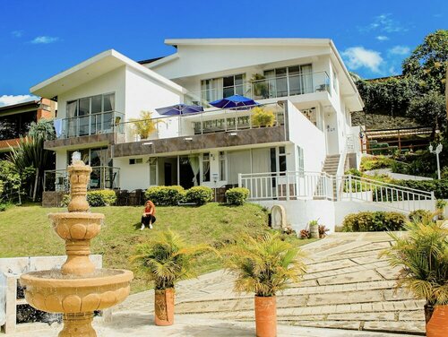Гостиница Hotel Boutique Palmas de Salento в Департаменте Киндио