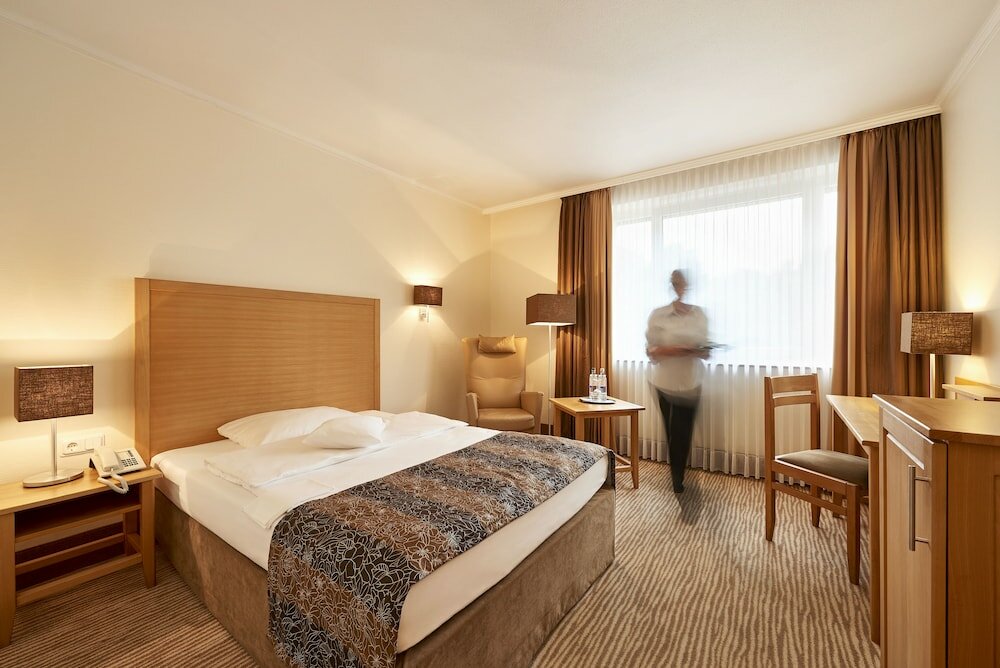 Фото Отель Munte-Wellnesshotel am Stadtwald