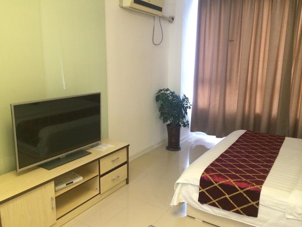 Фото Wanda Gold Dragon Holiday Apartment