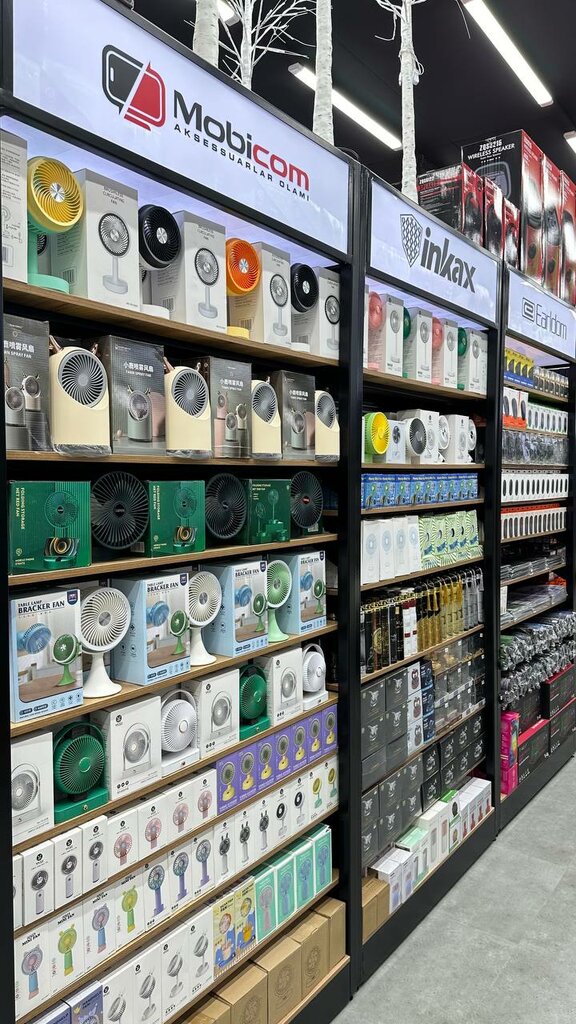 Товары для мобильных телефонов Mobicom, Бухара, фото