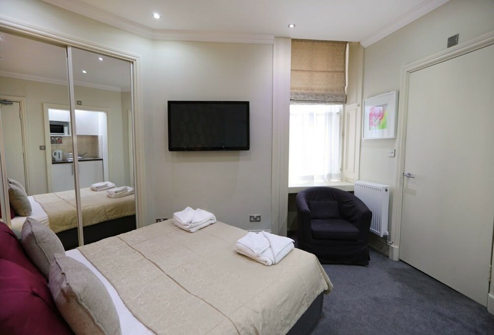 Фото Palmerston Suites