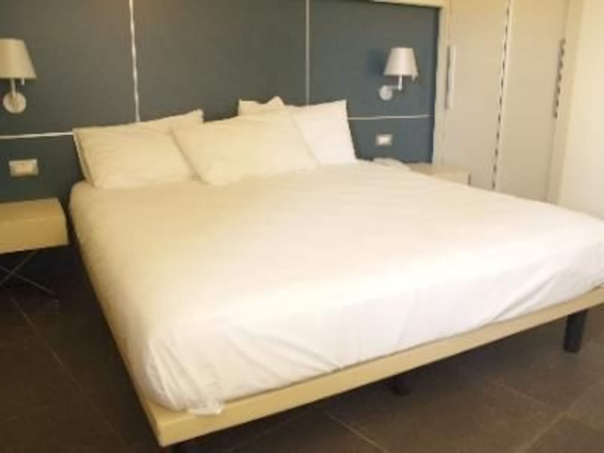 Фото Home Club Suite Hotel