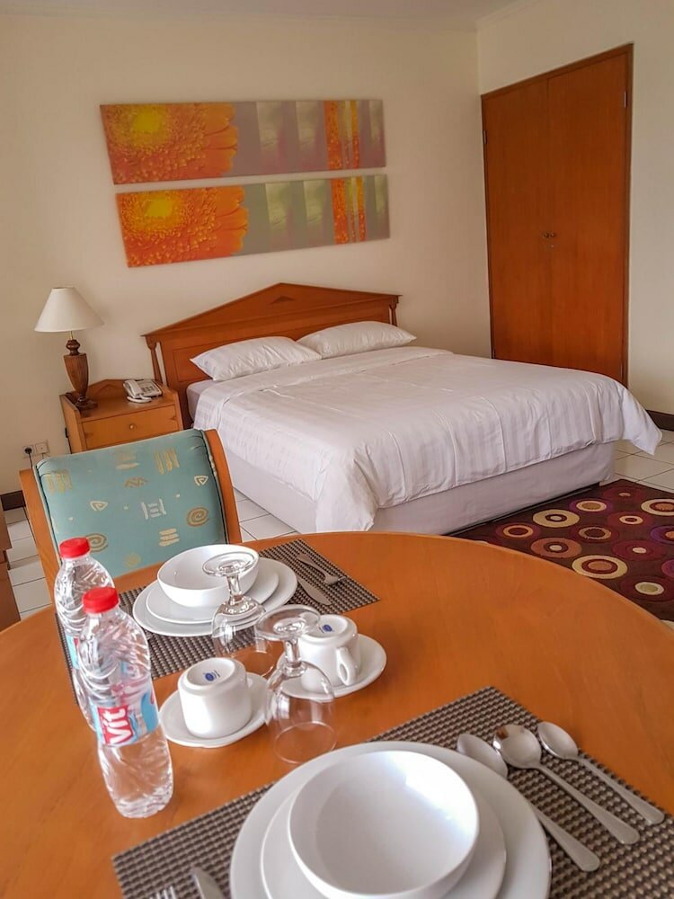 Фото Griya Prapanca Apartment