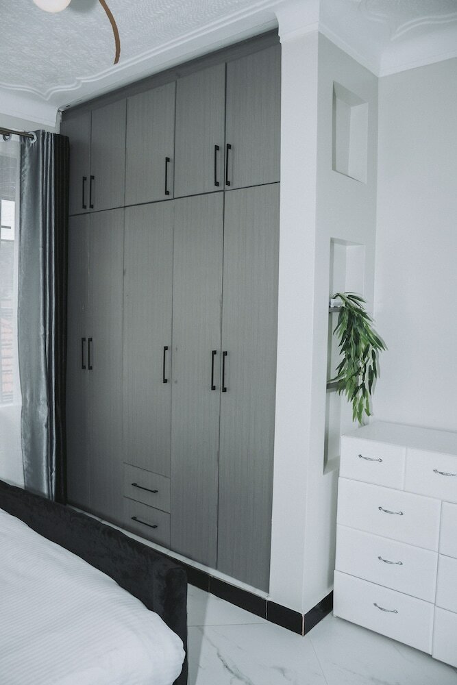 Фото Cozy Oasis Kyanja