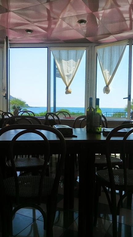 Фото Al Piccolo Scoglio - Room & Breakfast