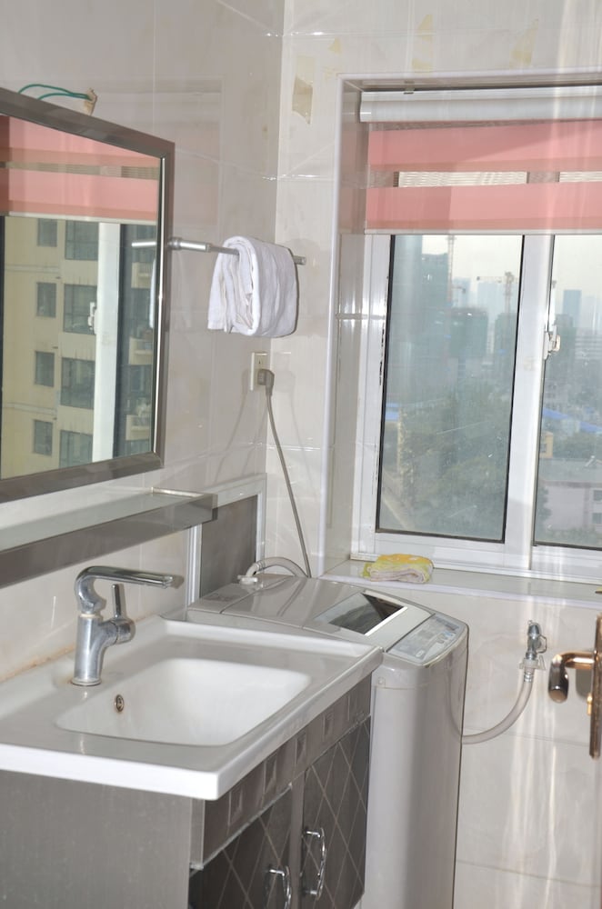 Фото Lanzhou Longshang Mingzhu Apartment Two-bedroom suite