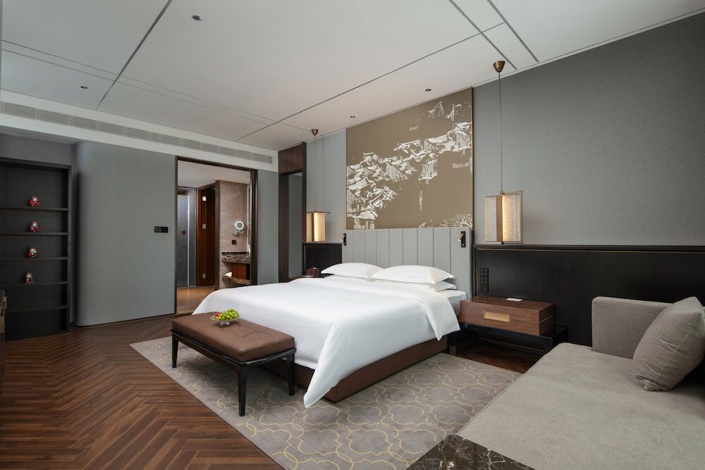 Фото Tiegang Jinjiangduchengjiudian