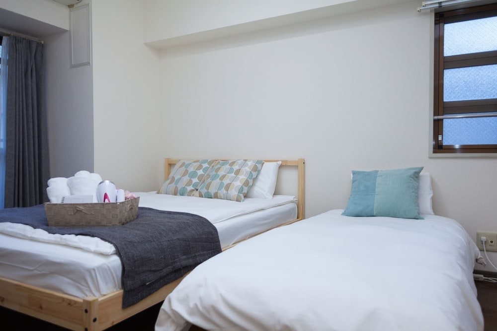 Фото Shinsaibashi Midtown Apartments