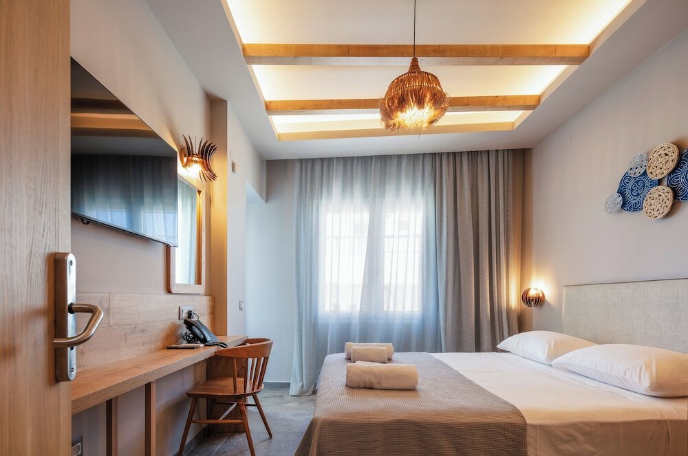 Фото Skipper Beachfront Suites