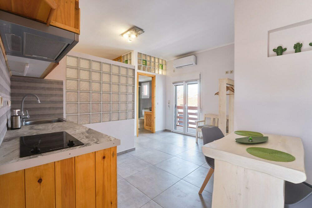 Фото Eressian Lodgings Apartments