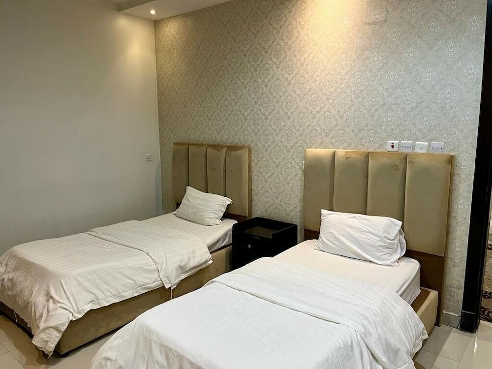 Фото Al-Aniqa Furnished Apartments