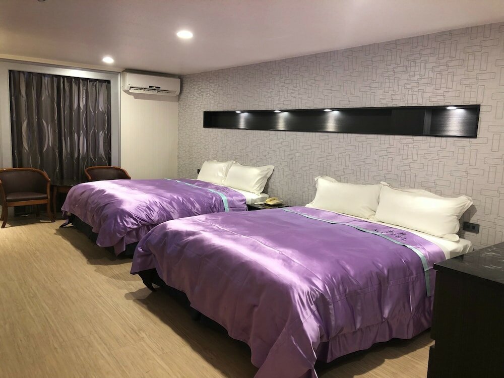 Фото Mu Yue Jingpin Motel