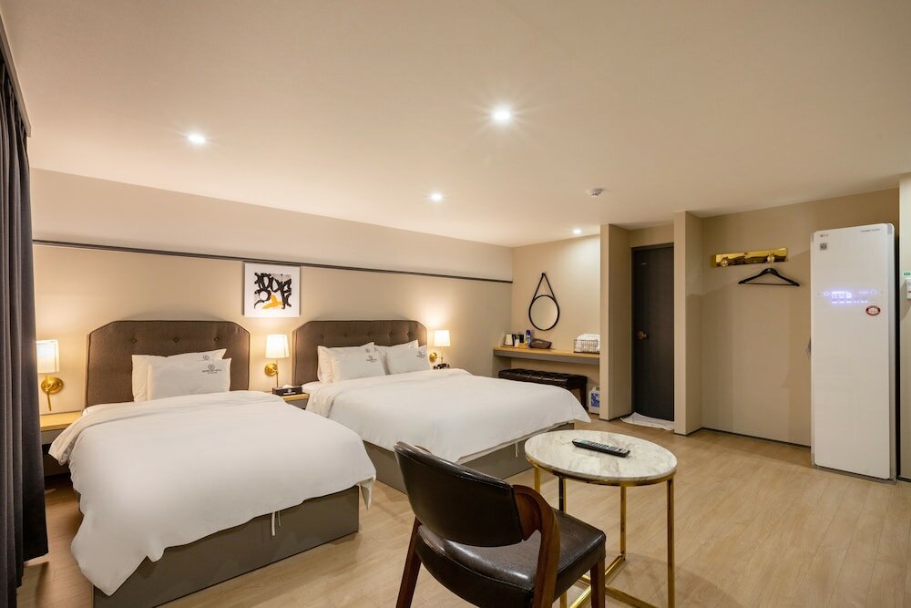 Фото Brown Dot Hotel Minam