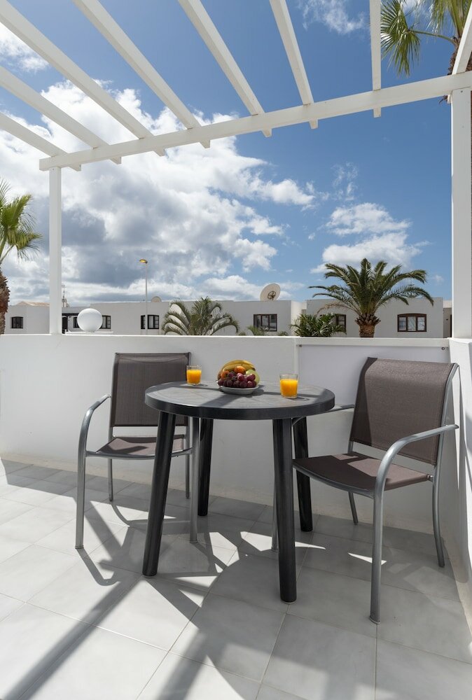 Фото Apartamentos Livvo Oasis