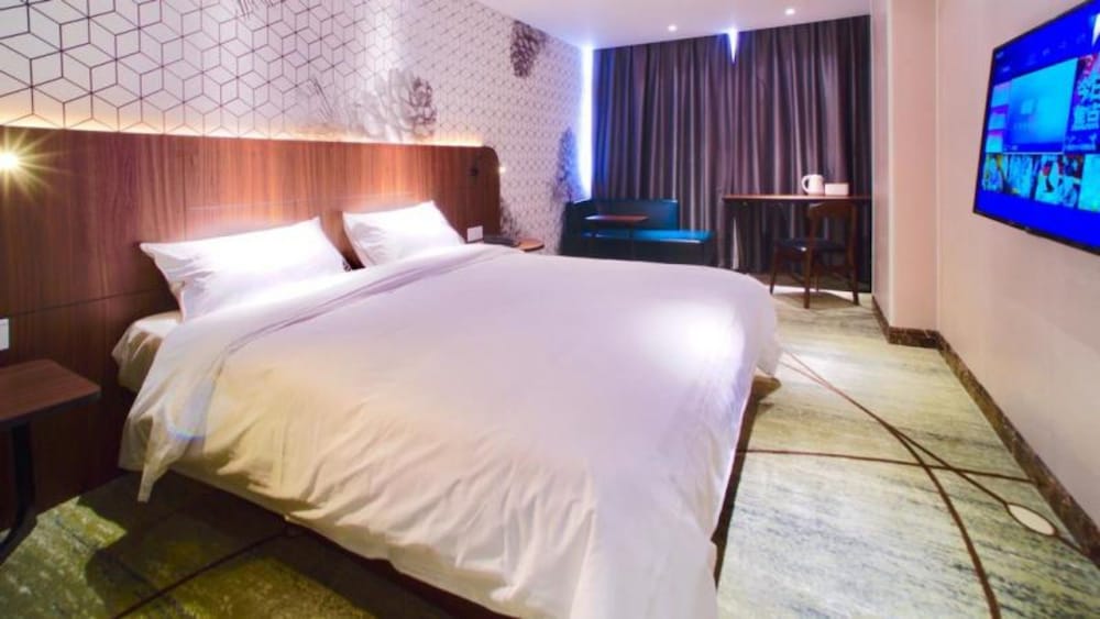 Фото Guangzhou Pinecone & Huayi Select Hotel