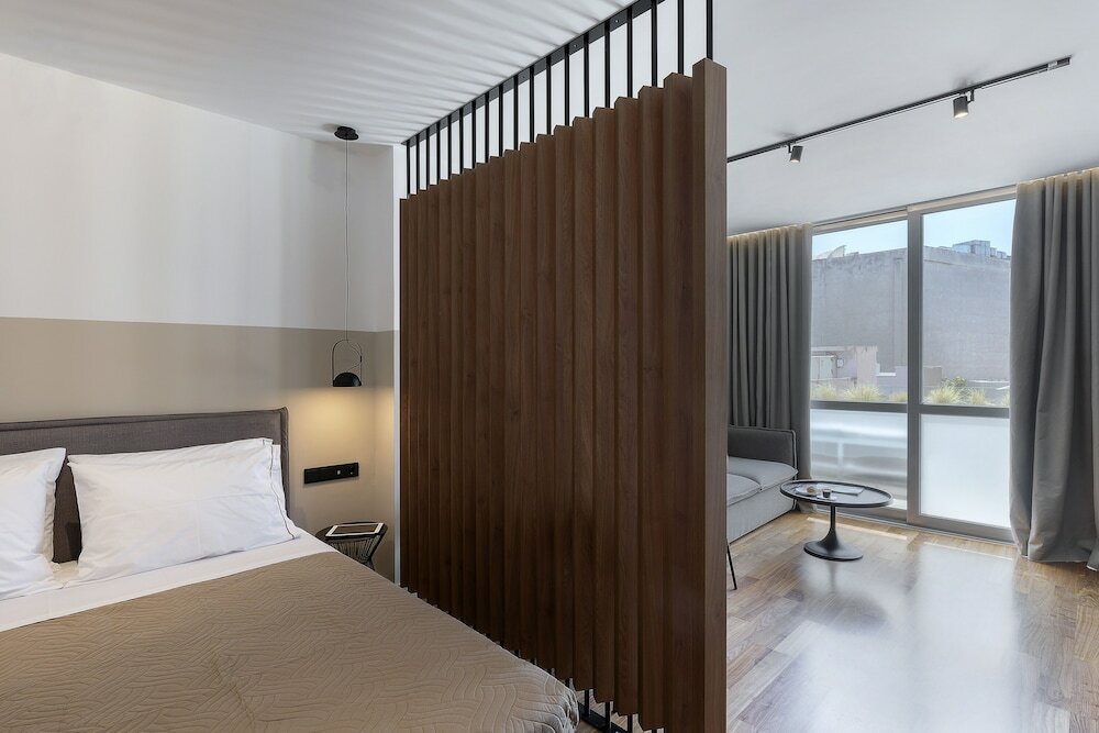 Фото The Athenians Art Apartments