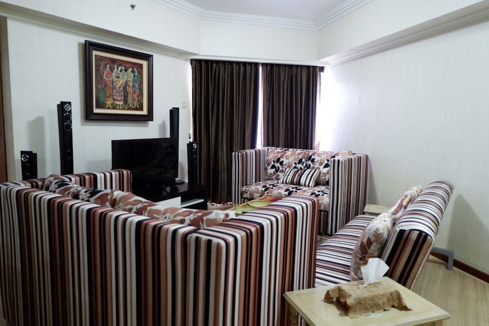 Фото 3BR Apartment at Sudirman Condominum Tower By Travelio