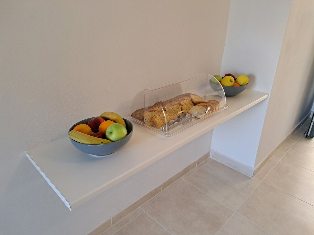 Фото Rafkon Luxury Apartments - Myrina