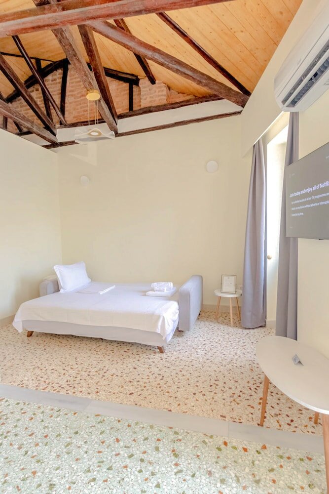 Фото Athens Plaka Family Suites