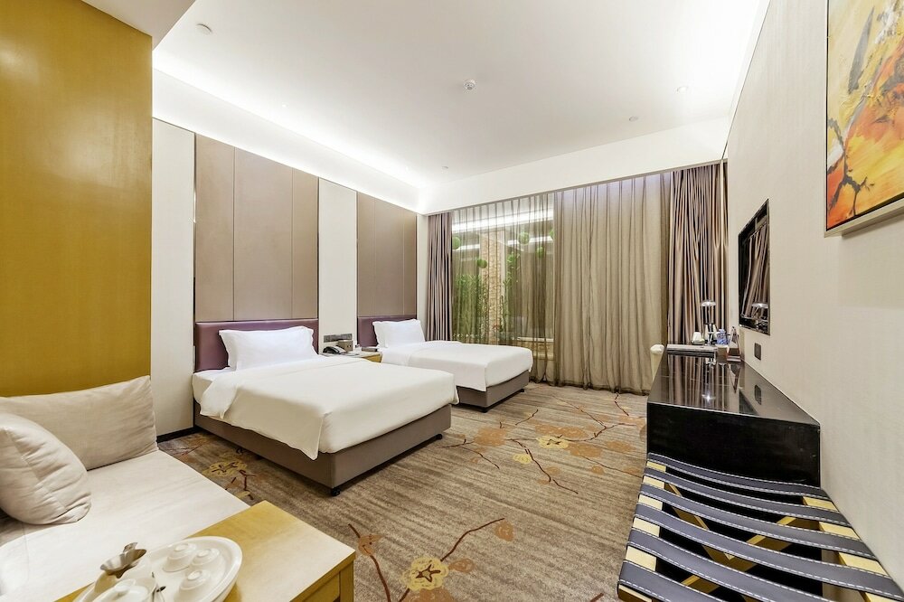 Фото Tianyuan Junlong Hotel