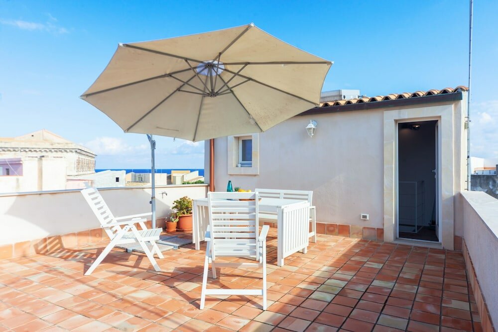 Фото Mercato di Ortigia Apartments