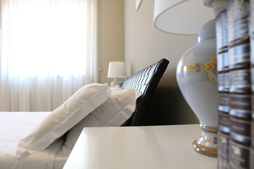 Фото Colonna Rooms & Apartment