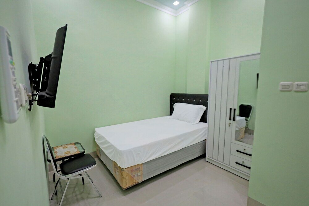 Фото Oyo 93059 Homestay Zafirah