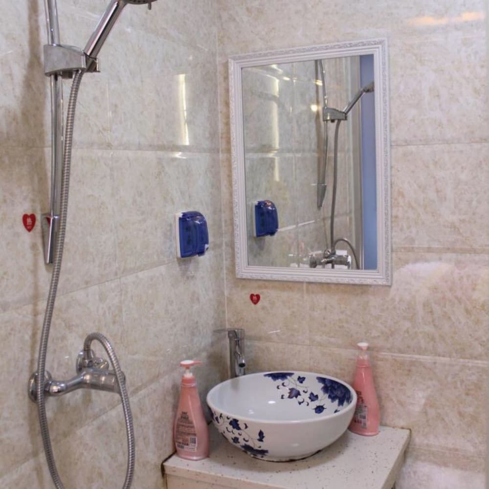 Фото Fenghuang Nanmu Inn No. 1