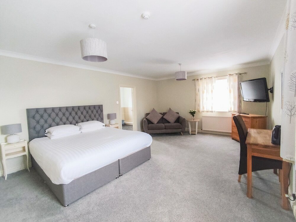 Фото Woodcote Hotel