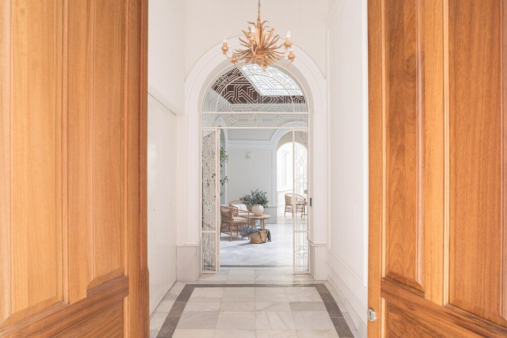 Фото Mylu Suites by Puerta Catedral