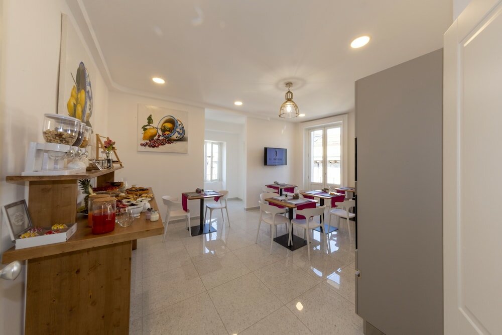 Фото Le Angioine Rooms