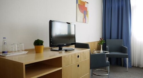 Гостиница Comfort Hotel Atlantic Muenchen Sued в Оттобрунне