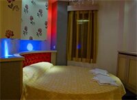 Фото Captain's Beach Boutique Apartments