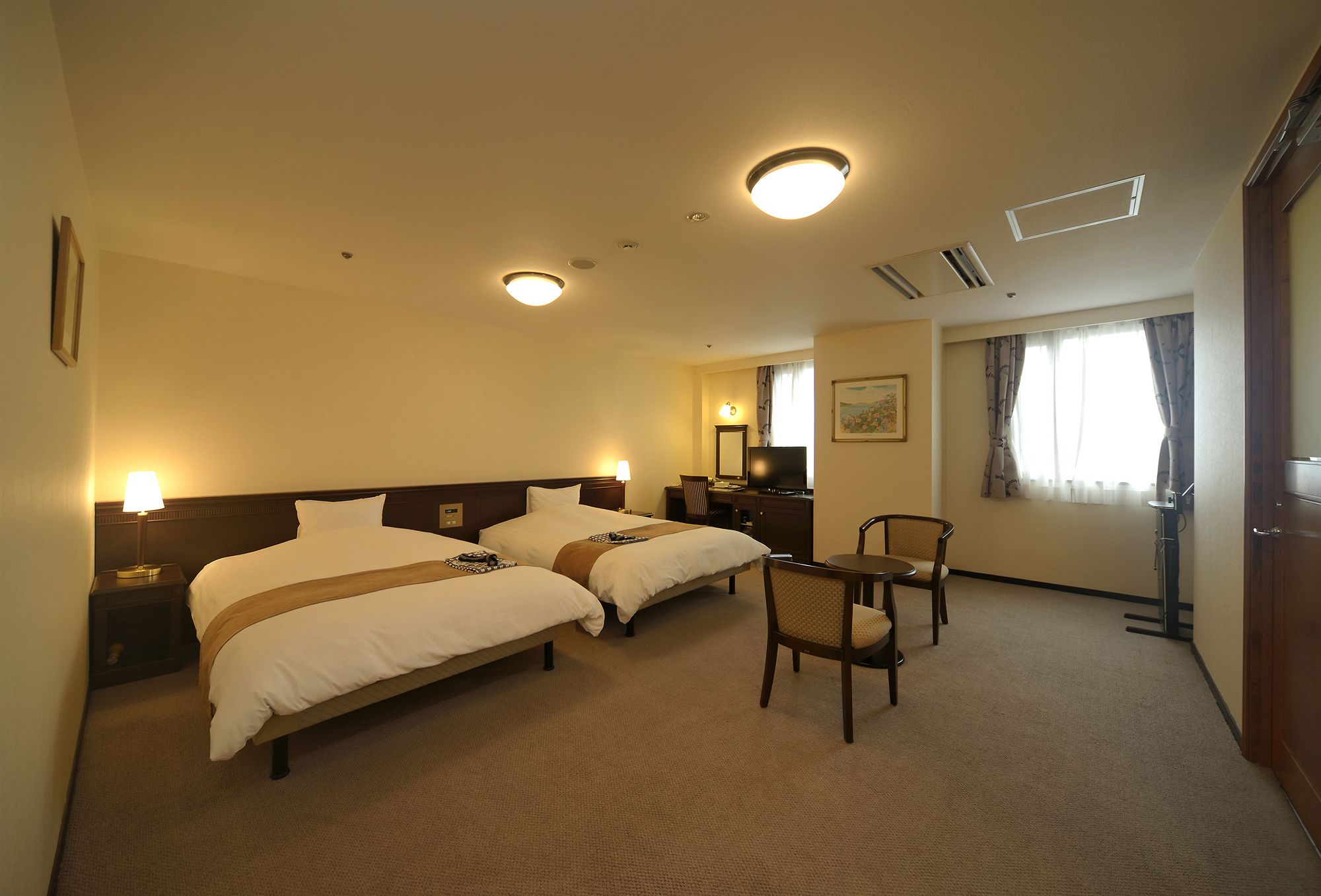 Фото Amami Sunplaza Hotel