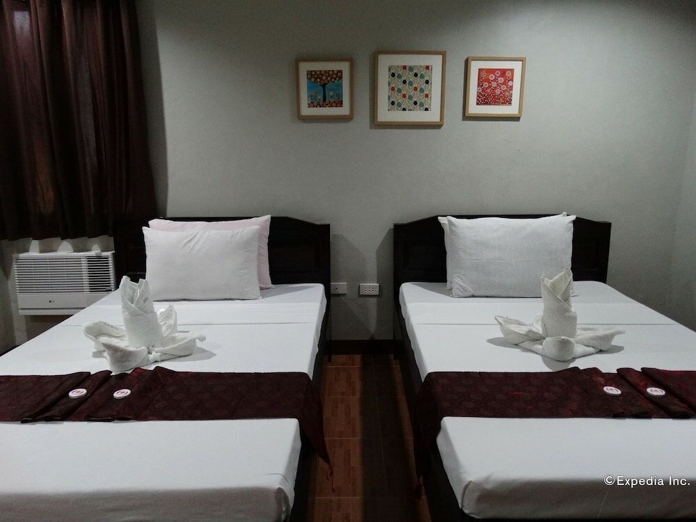 Фото Harbour Gardens Tourist Inn