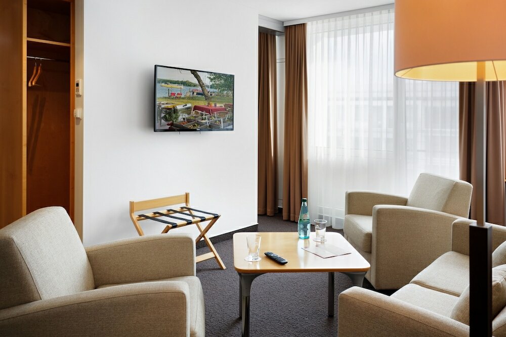 Фото Kongresshotel Potsdam am Templiner See