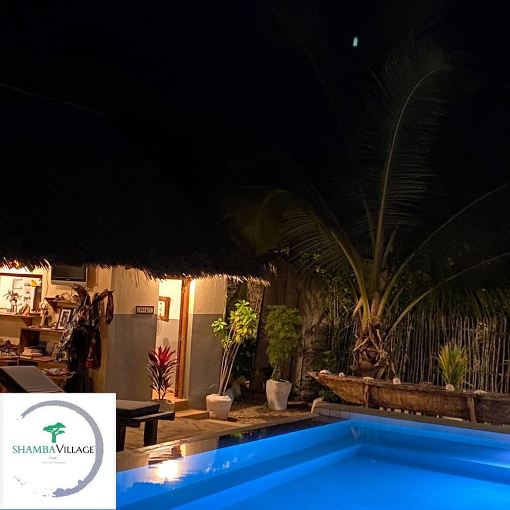 Фото Shamba Village Hotel