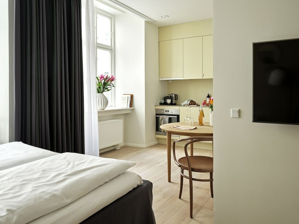 Фото Apēron Apartment Hotel