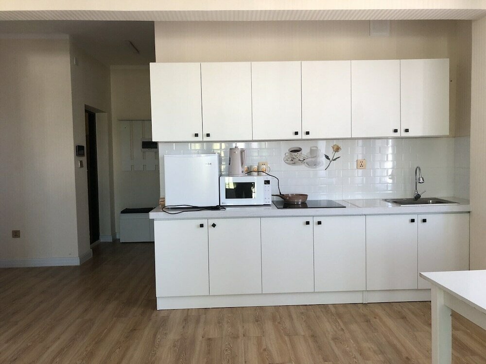 Фото Eagle Town Service Apartment