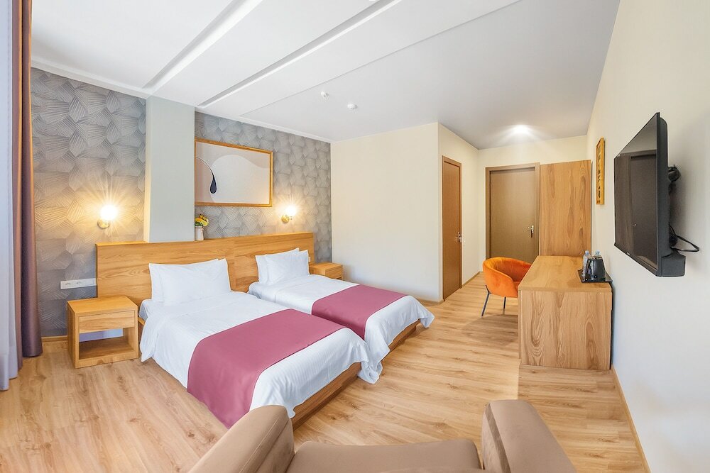 Фото Solo Grand Boshuri Hotel