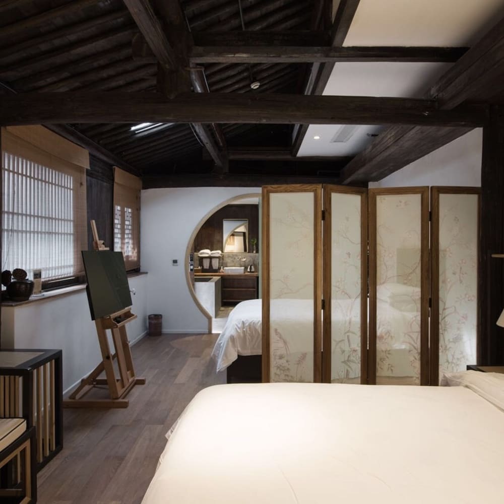 Фото Xiaochaguniang minsu