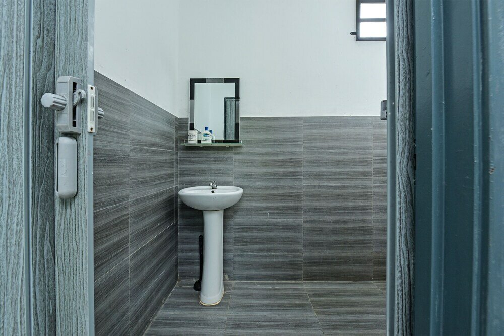 Фото Oyo Home 90682 Liliz Mambang Farmstay