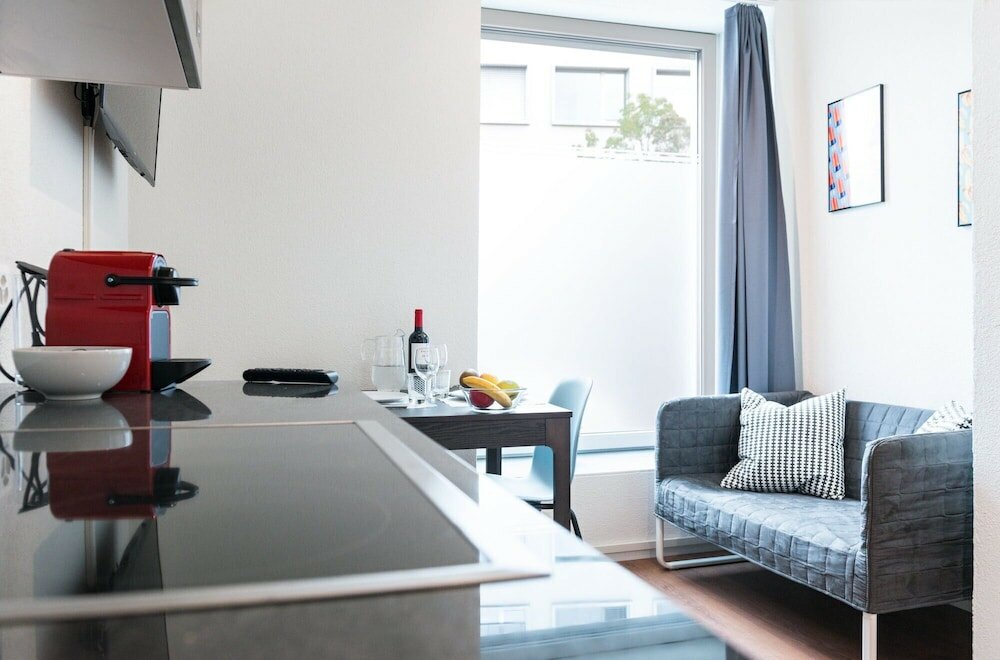 Фото Hitrental Altstetten Apartments