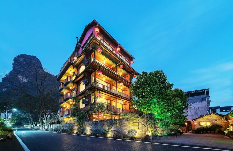 Гостиница Yangshuo Mountain Nest Boutique Hotel