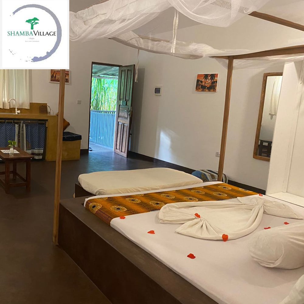 Фото Shamba Village Hotel