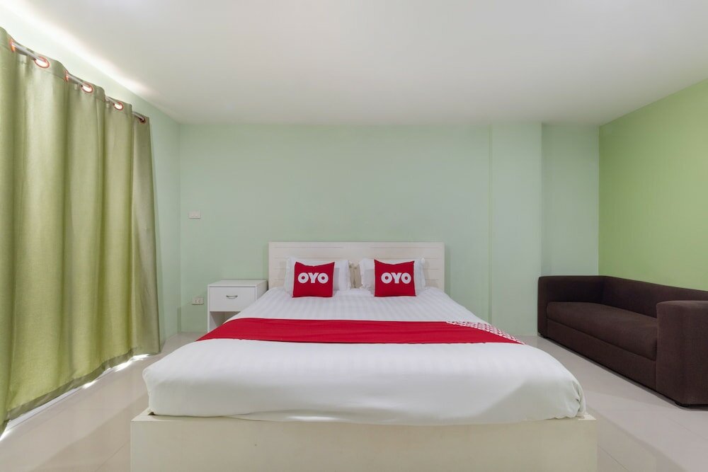 Фото Oyo 75363 V Place Apartment